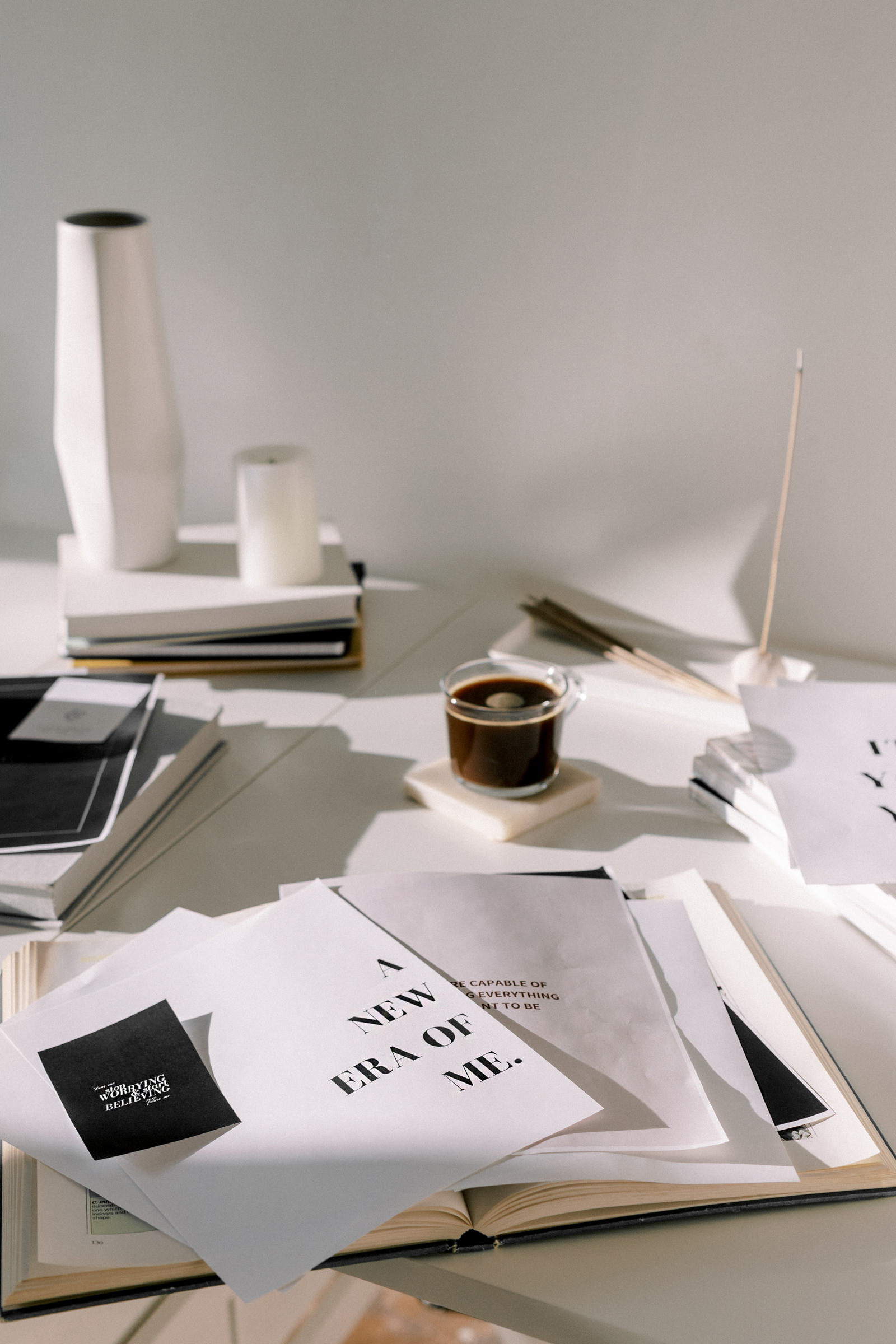 Coffee on Table with Papers